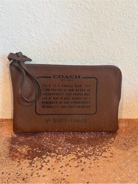 Coach large zip wristlet.